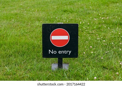 No entry sign standing on grass. No people. Copy space. - Shutterstock ID 2017164422