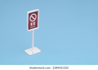 No entry text on warning sign on blue background, copy space for text. - Shutterstock ID 2289421325