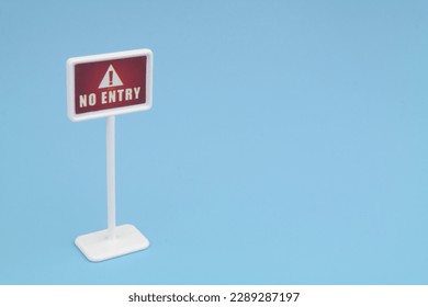 No entry warning sign on blue background with space for text. - Shutterstock ID 2289287197