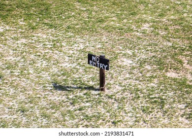 No Entry Wooden Rustic Sign On A Lawn