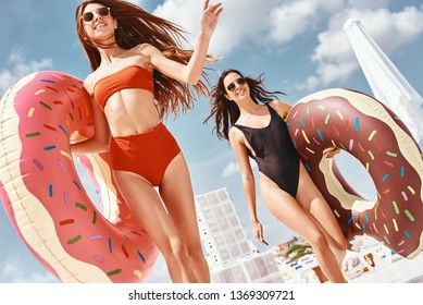 There’s no fear when you’re having fun. Girls having fun at the rooftop swimming pool
