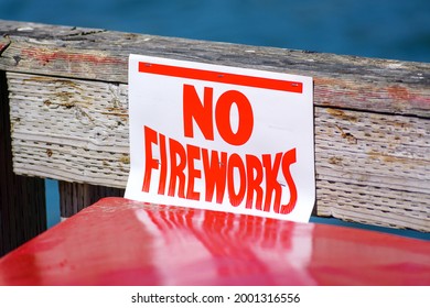 No Fireworks Sign On The Wooden Fence Informs About Fire Danger And That Fireworks Are Not Allowed And Prohibited. Close Up.