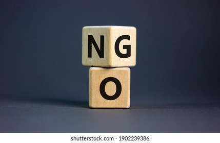 No or go symbol. Turned a cube, changed the word 'no' to 'go'. Beautiful grey background. Copy space. Business, motivation and no or go concept. - Shutterstock ID 1902239386
