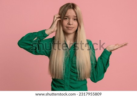 No idea, I dont know answer. Puzzled clueless uncertain caucasian woman raising hands in helpless gesture, embarrassed confused by difficult question. Confused pretty girl on pink studio background