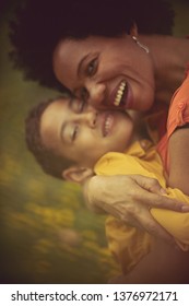  No Job More Rewarding Than Being A Mom. Mother And Son In The Park.