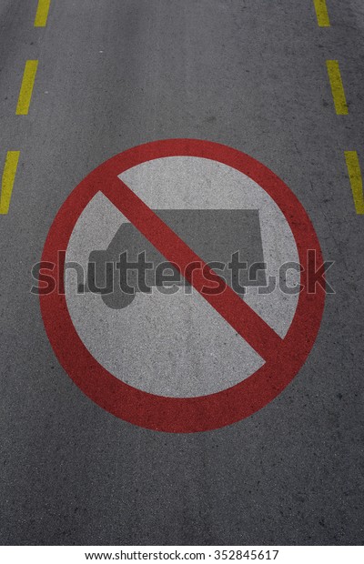 No large\
trucks Sign Icon on the asphalt\
street