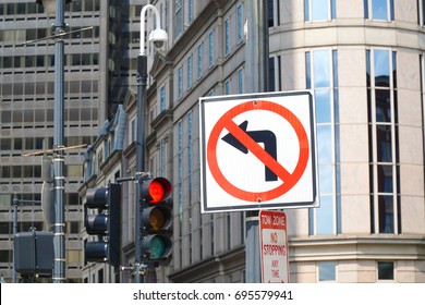 No Left Turn Sign On The Street