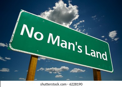 "No Man's Land" Road Sign with dramatic blue sky and clouds. - Shutterstock ID 6228190