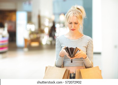 No Money Left. Mature Disappointed Woman Looking Into Her Empty Wallet After Shopping Too Much Poor Shopaholic Money Credit Loan Upset Sad Depressed Empty Cash Unhappy Overspending Concept Copyspace