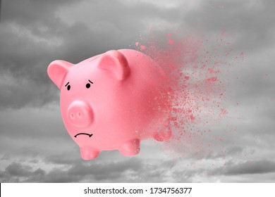 No Money Or Savings Have Disappeared. Piggy Bank Turns Into Sand Against The Sky.