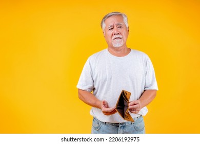 No Money In Wallet ,unemployed Asian Old Man Opening Empty Wallet Money Broke Cash, Bankruptcy Economic Financial , Poverty In Retirement And Unemployment Concept.