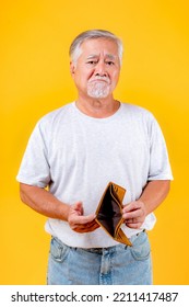 No Money In Wallet ,unemployed Asian Old Man Opening Empty Wallet Money Broke Cash, Bankruptcy Economic Financial , Poverty In Retirement And Unemployment Concept.