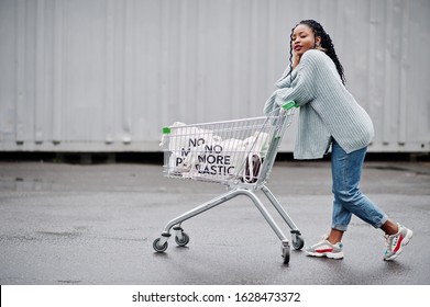 No More Plastic. African Woman With Shopping Cart Trolley And Eco Bags Posed Outdoor Market.