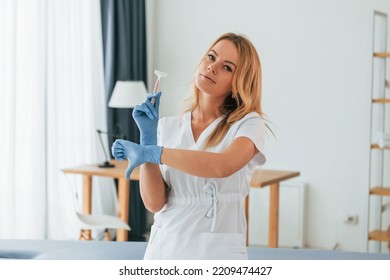 No More Razor. Sugaring Concept. Female Doctor In White Coat Is Standing In The Clinic.