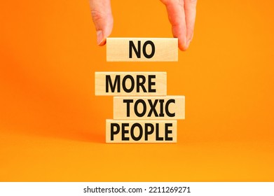 No more toxic people symbol. Concept words No more toxic people on wooden blocks on a beautiful orange table orange background. Psychologist hand. Business, psychological no more toxic people concept. - Shutterstock ID 2211269271
