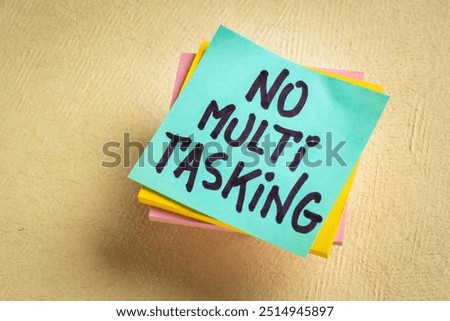 no multitasking - efficiency advice or reminder - handwriting on a sticky note