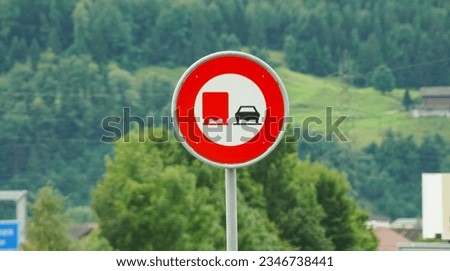 No overtaking for trucks road sign on highway