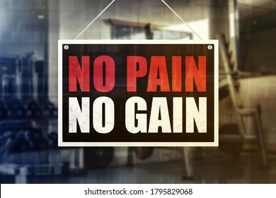 No Pain No Gain Sign in front of a gym background. Motivation or encouragement concept. - Shutterstock ID 1795829068