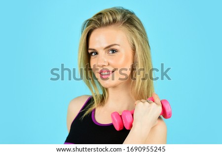 no pain no gain. woman doing exercises with dumbbells. athletic woman with perfect body. sportswoman has strong biceps. Believe you can do more. powerlifting concept. Strength and motivation.