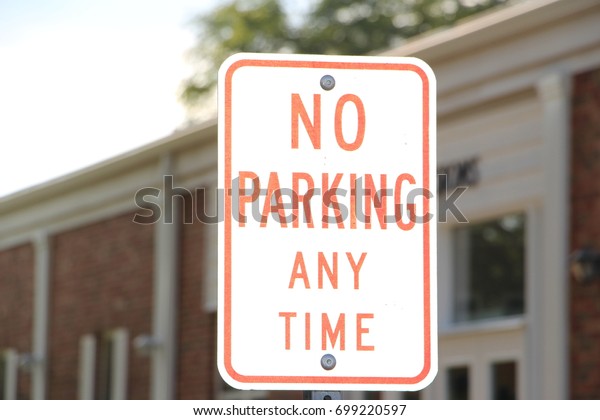 No parking any time\
sign