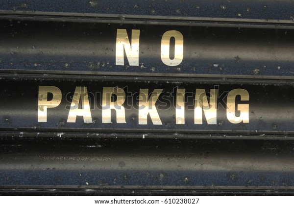 A no parking\
sign