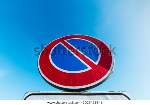 no parking sign and clear\
sky