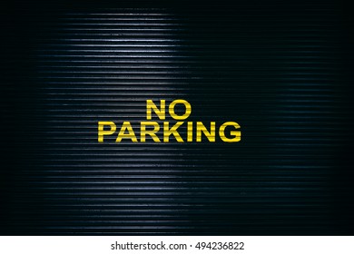 No Parking Sign On A Garage Door