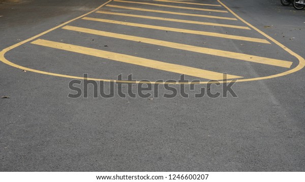 No parking\
sign in yellow coloured line on\
street