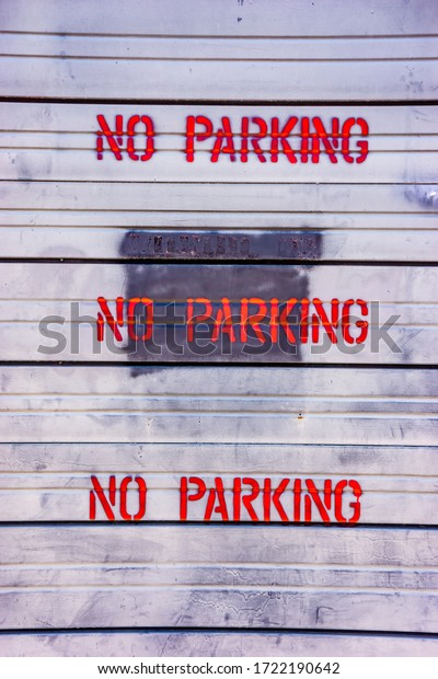 No parking signs\
on a dirty old background