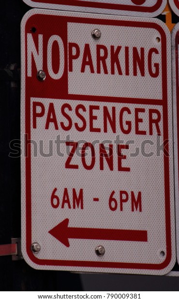 NO PARKING STOPPING 
SIGNS