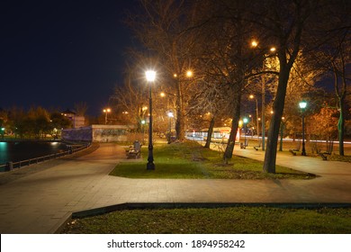 No People. Desert Alley Of Public Park In Autumn Night During Coronavirus Pandemic In Moscow. Long Exposure Photography