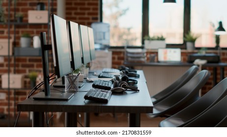 No People At Desk With Monitors And Headphones, Workspace Prepared For Telework Communication At Call Center Company. Empty Workstation With Computers And Headsets At Customer Service.