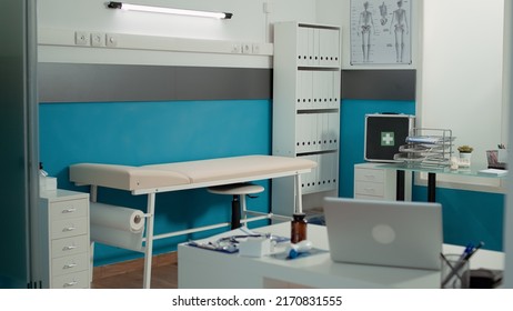 No People In Doctor Office Used For Consultation And Appointments, Empty Cabinet With Medical Equipment, Instruments And Pills Bottle On Desk. Nobody In Examination Visit Space.