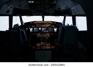 No People In Empty Captain Cabin Used To Fly Airplane With Dashboard Command And Control Panel Navigation. Throttling Engine Lever And Flying Jet With Buttons, Power Switch And Handle.