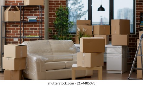 No People In Empty Real Estate Apartment With Moving Boxes And Cardboard Storage Containers. Nobody In Household Property Filled With Packages And Furniture For Relocation Decor.