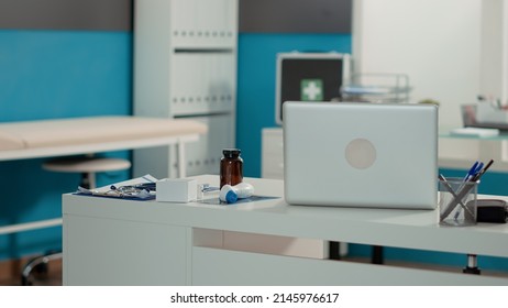 No People In Medical Cabinet With Empty Desk And Instruments, Used For Consultation Appointment. Nobody In Clinical Office With Professional Equipment And Technology For Checkup Visit.