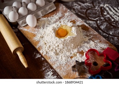 No People Photo Of A Flour Pile With Egg Yolk And White On Top Of Messy Kitchen Table