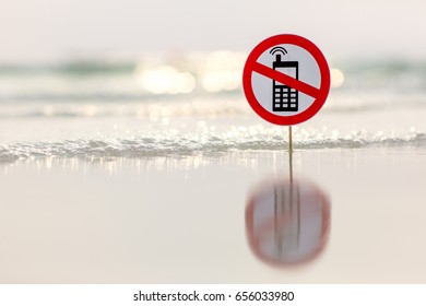 "No phone calls" sign on the beach on sea background
 - Shutterstock ID 656033980