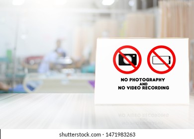 No photos and video allowed to take or recording pictures of the working station in the hospital on blurred background interior hospital doctors operation treatment with patient
