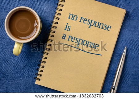 no response is a response note in a spiral notebook with a cup of coffee - answer, reply and communication concept