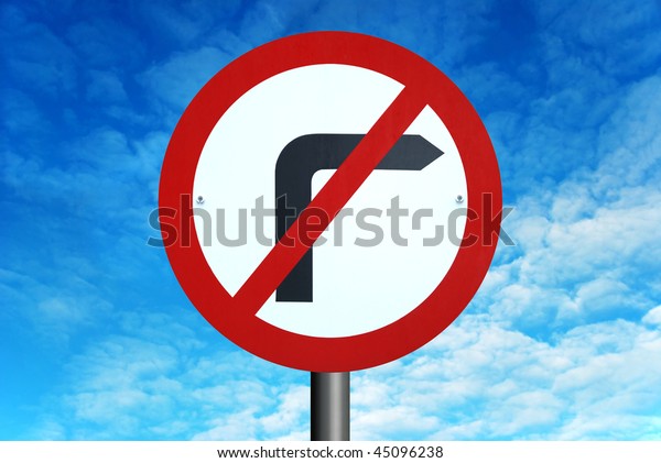 No Right Turn road sign, against a background of a\
bright blue summer sky.