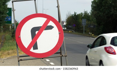 no right turn sign on busy uk motorway traffic in sunny afternoon in england uk