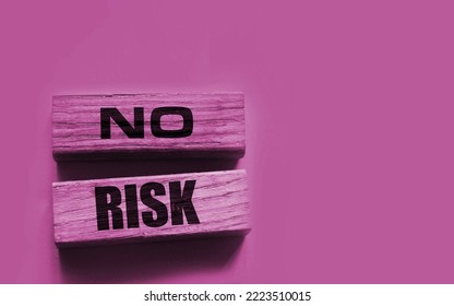 No Risk Words On Wooden Blocks On Yellow Background. Risk Management Concept.