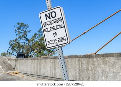 No skateboarding, rollerblading, or bicycle riding sign on top of the armored levee along Lake Pontchartrain in New Orleans, Louisiana, USA - Shutterstock ID 2209528425