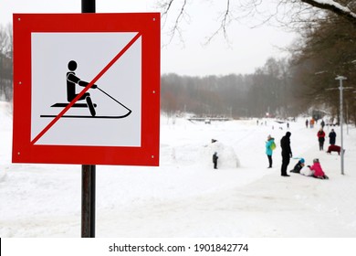 No Sledding Sign In The Snowy Park. Children Safety During Winter Holidays