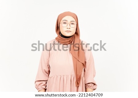No Smile Looking at Camera of Beautiful Asian Woman Wearing Hijab Isolated On White Background
