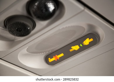 No Smoking And Fasten Seat Belt Sign Inside An Airplane