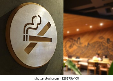 No Smoking Sign With Bokeh Restaurant Background 