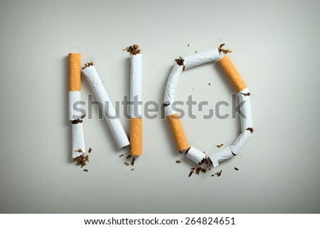No smoking sign made with broken cigarettes