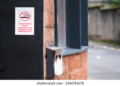 No Smoking Sign And Metal Ash Tray Outside Pub 